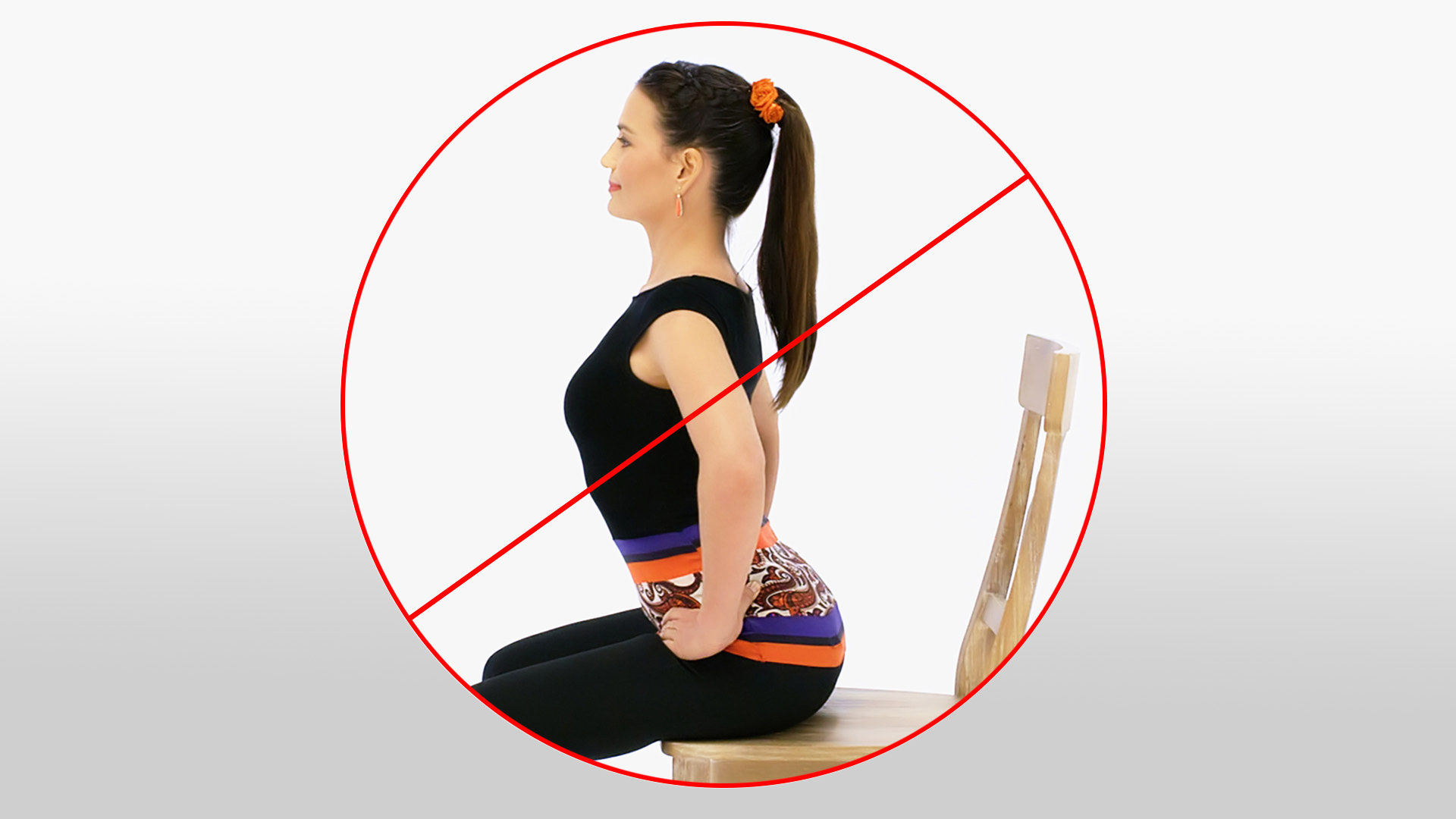 Prohibition symbol over a woman doing a backbend while seated on a chair, indicating this pose should be avoided